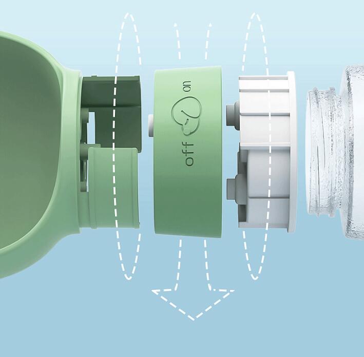 Fold-out bowl on the dog travel water bottle in use